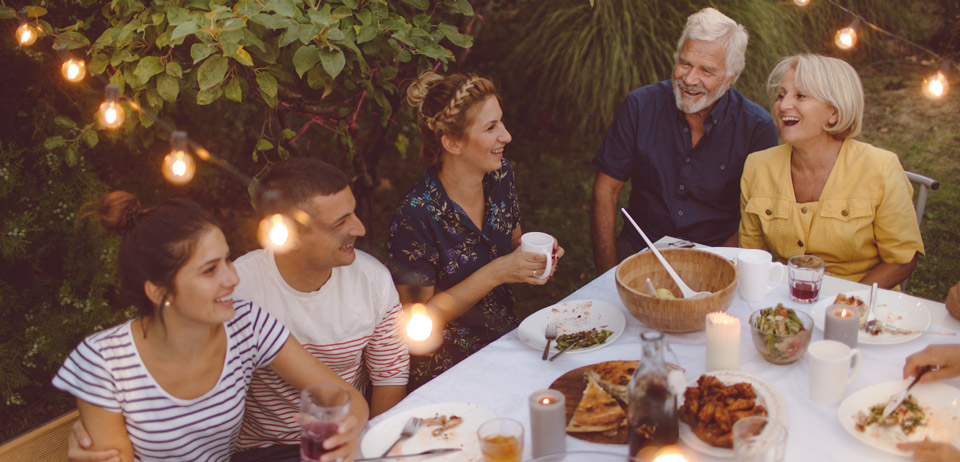 Family outdoor dinner in summer - Money saving tips - Auswell Energy Gold Coast